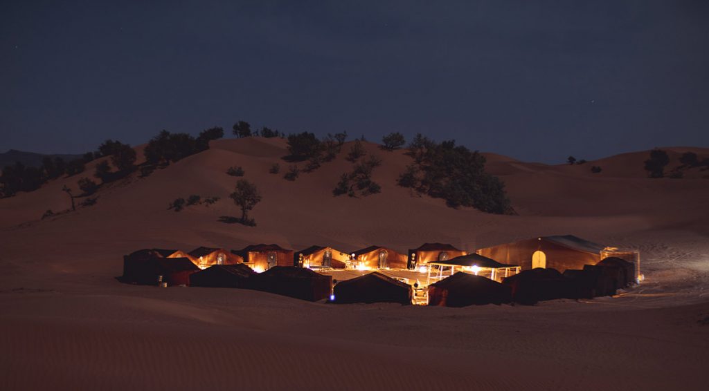 desert camp in erg chegaga at night