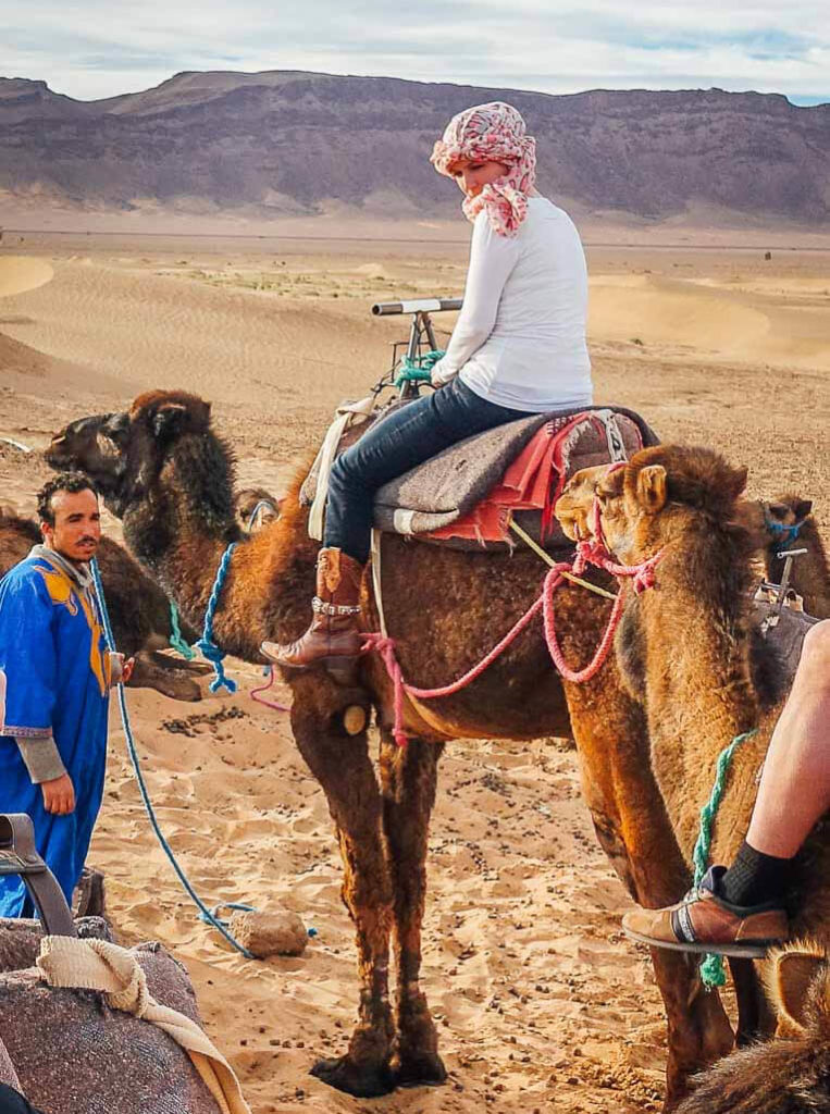 Woman on a dromedary in Morocco